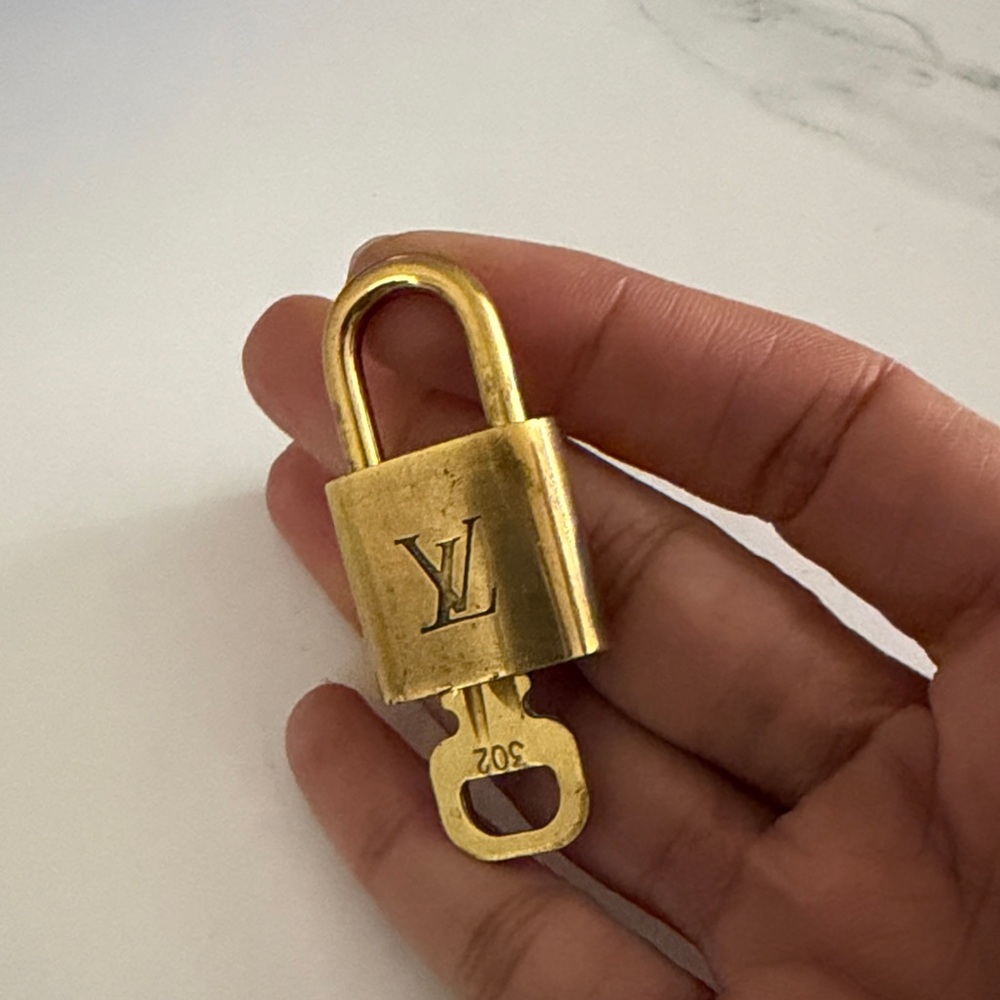 Louis Vuitton Luxurious Gold Lock and Key #302